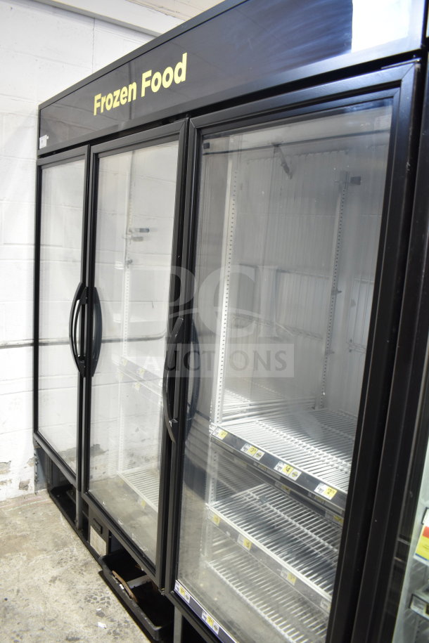 2018 True GDM-72F-HC 3-door reach-in freezer merchandiser, black frame, glass doors, for commercial use, excellent condition.