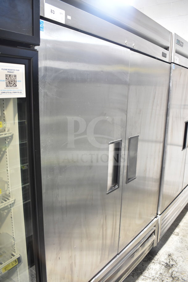 2020 True T-49F-HC 2 Door Reach-In Freezer, stainless steel, on casters, 115V, 1 phase, commercial grade, visible minor wear.
