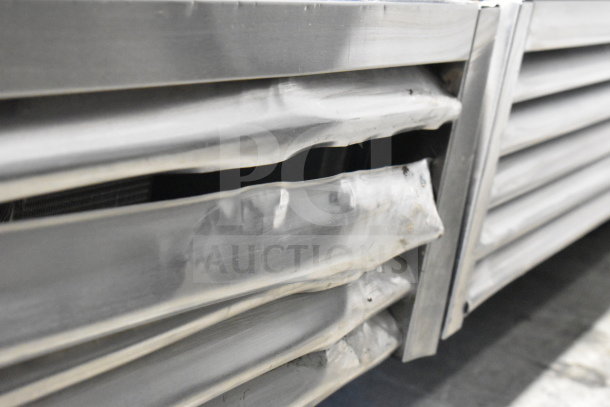 2020 True T-49F-HC commercial freezer, two-door, dented exterior, on casters, 115V, 1 phase.