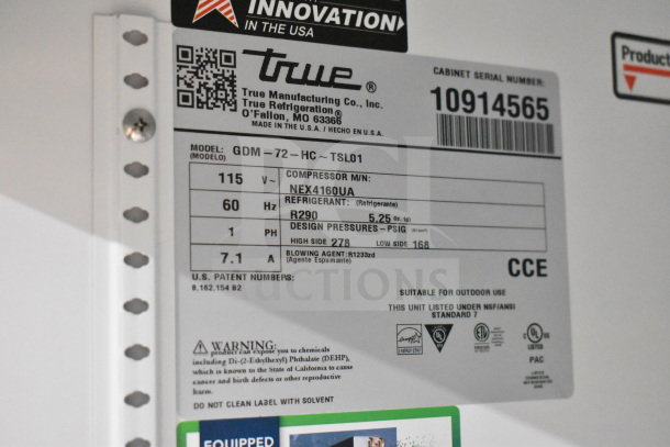 True GDM-72-HC commercial cooler label showing model, voltage, refrigerant type, and certification details.