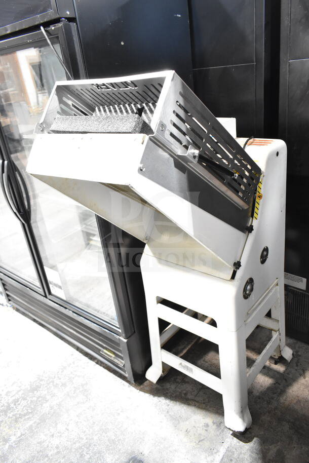 Oliver 797-32NC Commercial Bread Slicer with Pro Guard Chute in good condition. 115 Volts, 1 Phase, floor style.