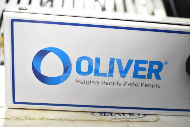Oliver 797-32NC Commercial Floor Bread Slicer with Pro Guard Safety Chute, 115V, 1 Phase, shown in excellent condition.
