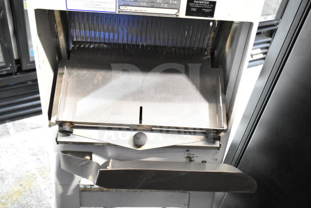 Oliver 797-32NC commercial bread slicer, Pro Guard safety chute, 115 volts, 1 phase, used, visible wear, model plate shown.