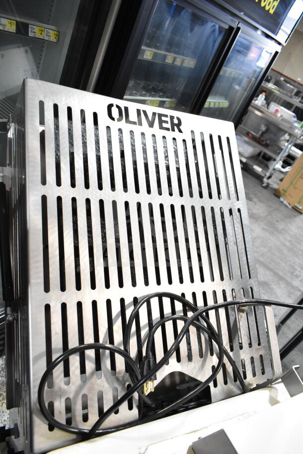 Oliver 797-32NC Commercial Bread Slicer with Pro Guard. Floor model, 115V, visible safety chute, excellent condition.