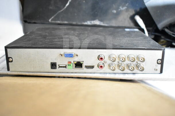 15 Various Items Auction: Night Owl 8 Channel DVR shown with multiple ports, moderate wear. Includes other electronics and audio gear.