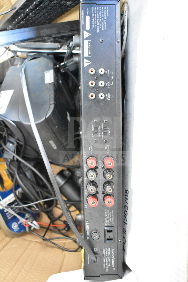 15 electronic items including AudioSource AMP100 amplifier, DVRs, keyboards, Epson printer and speakers. Cables visible.