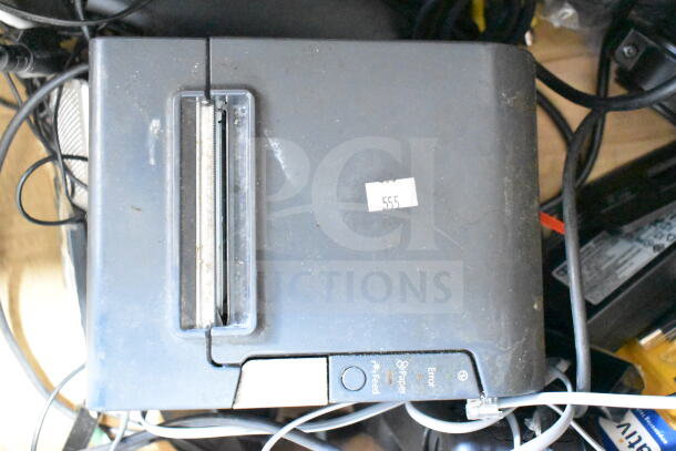 Epson receipt printer in used condition with visible cables, label marked "555," part of a 15-item auction bundle.
