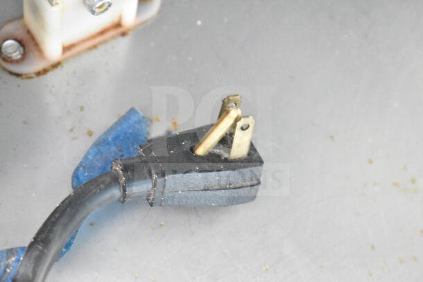 2017 True T-35-HC cooler plug; 115 volts, 1 phase, black with three prongs, moderate wear.