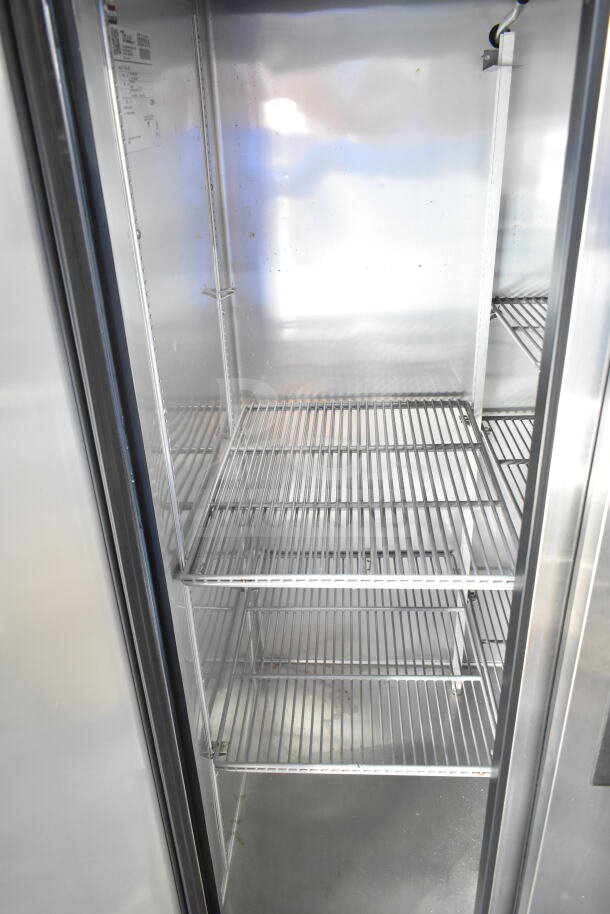 2017 True T-35-HC 2 Door Reach-In Cooler, 115V, 1 Phase, internal metal shelves, labels visible, commercial use.