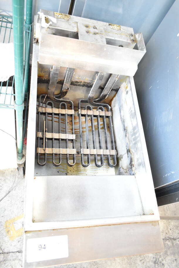 Vulcan 1ERD50 commercial electric deep fryer on casters, 480V, 3 phase, shows wear, interior heating element visible, label reads "94".