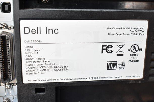 Dell 2350dn Countertop Printer label showing model, power ratings, and compliance logos. Made in China.