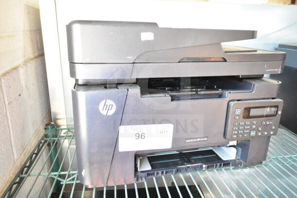 HP LaserJet Pro MFP M127fn printer, designed for offices, features a control panel and document feeder. In used condition.