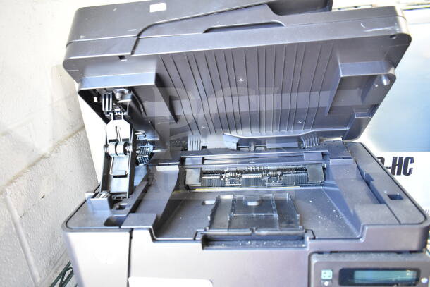 HP LaserJet Pro MFO M127fn Countertop Printer, open scanner lid, showing internal components, good condition.