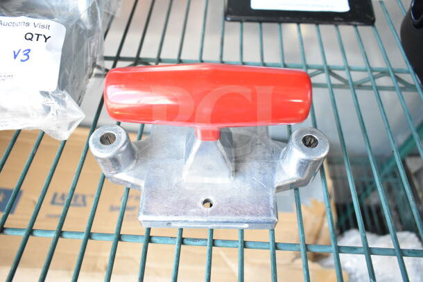 General Electric LED driver, metal vegetable cutter pusher with red handle, and satin silver 3-chamber shower dispenser.