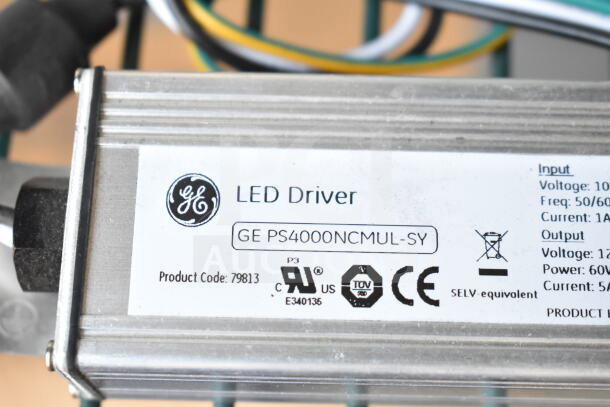 General Electric LED Driver GE PS4000NCMUL-SY in metallic casing. Features CE, TUV, and US certification logos. Product code: 79813.