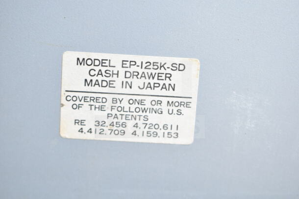 Clover Cash Drawer, Model EP-I25K-SD, made in Japan, features U.S. patent numbers, indicating originality.
