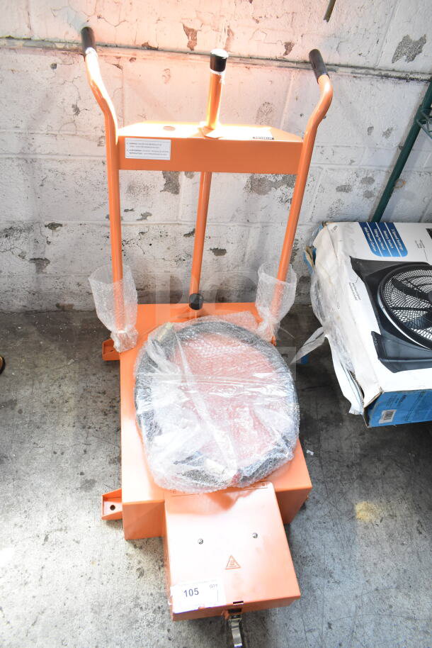 Brand new Fryclone oil caddy with minor scratches and dents. Orange frame, black hoses; protective wrap on handles.