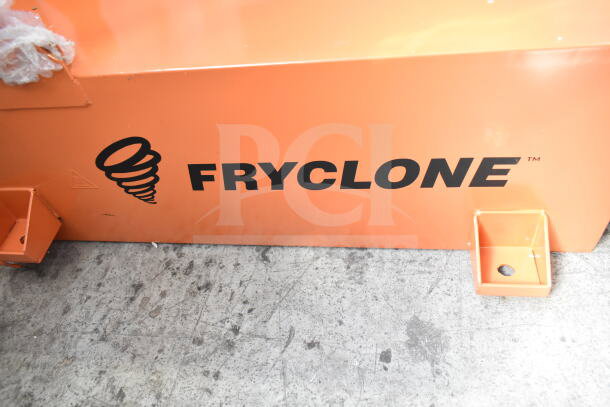 Brand new Fryclone Oil Caddy, orange with minor scratches and dents, features the Fryclone logo.