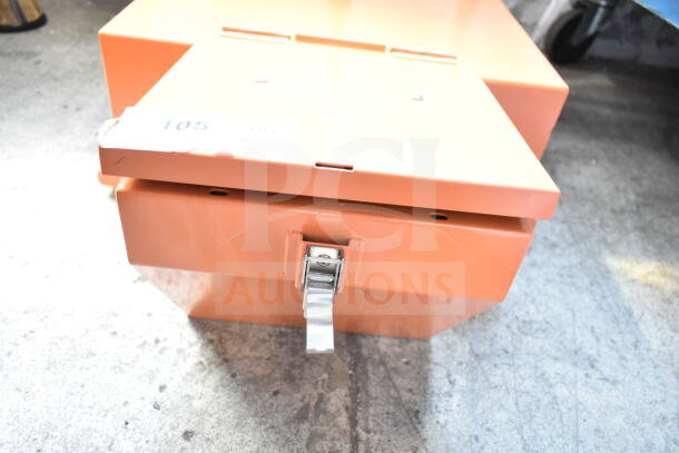 BRAND NEW SCRATCH AND DENT Fryclone Oil Caddy in orange. Features a latch closure and minor cosmetic marks.