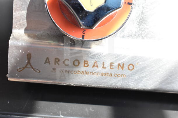 Arcobaleno APCT24 Elena electric pasta cooker dial, prominently showing brand logo and contact details.