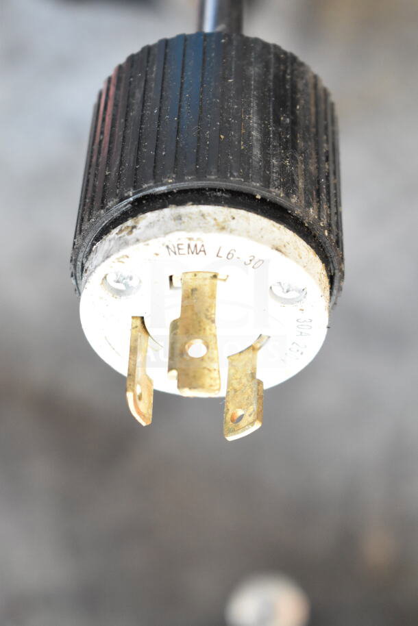 Close-up of a NEMA L6-30 plug on the Arcobaleno APCT24 Elena 4.5 Gallon Electric Countertop Pasta Cooker. Plug reads "30A 250V".