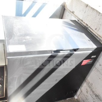 Frigidaire FGFRF7009-BLACK chest freezer, black, garage ready, 115 volts, 1 phase, appears in good condition.