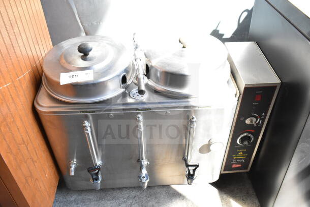 Cecilware CL100-N twin 3-gallon automatic coffee urn, stainless steel, dual spouts, model label visible, good condition.