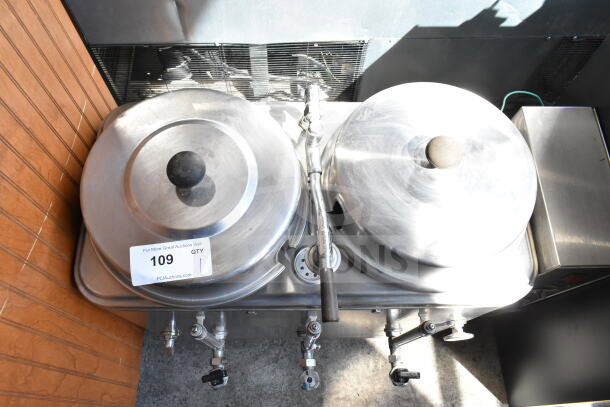 Cecilware CL100-N Twin 3 Gallon Automatic Coffee Urn, stainless steel, dual lids, spigots, auction tag visible, used condition.