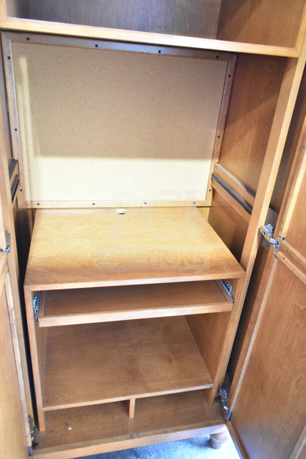 Wood Pattern 2 Door Cabinet with adjustable shelves. Features a warm wood finish and sturdy build. Good condition.