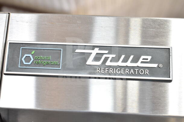 2022 True T-35-HC commercial 2-door cooler, stainless steel, natural refrigerant label, 115 volts, excellent condition.