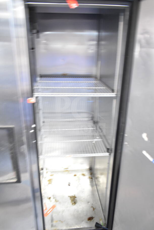 2022 True T-35-HC Commercial 2 Door Reach In Cooler, stainless steel interior, visible wire shelving, 115 Volts.