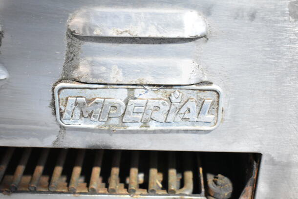 Imperial Commercial Gas Powered Cheese Melter, stainless steel, used condition, visible brand logo, some wear.