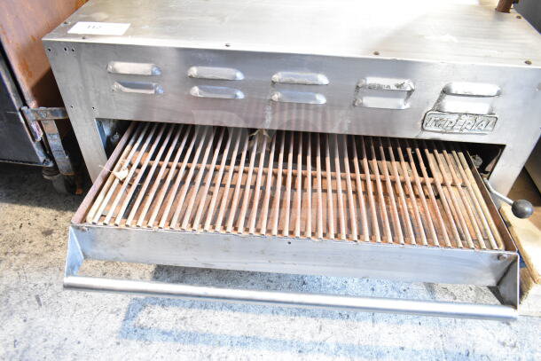 Imperial Commercial Gas Powered Cheese Melter, stainless steel, visible wear, Imperial branding, pull-out grill tray.