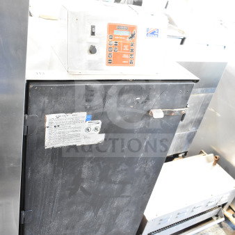 CookShack 250 Commercial Electric Smoker Cabinet, 208 volts, in used condition with visible labels indicating model and safety info.