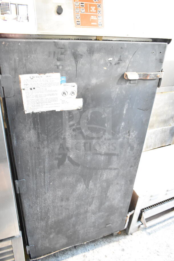 CookShack 250 Commercial Electric Smoker, 208V, features label with caution notice and UL certification, used condition.