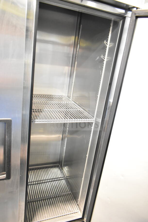 2017 True T-35-HC commercial 2-door reach-in cooler, stainless steel interior, shelves visible, 115 volts.