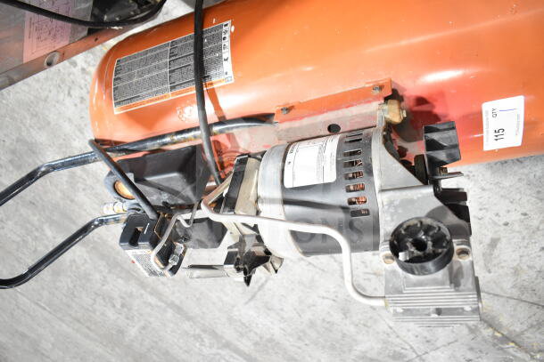Craftsman air compressor, orange tank, visible model and safety labels, used condition, item tag "115".