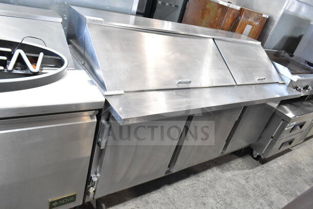 Beverage Air SP72-30M sandwich prep table, stainless steel, triple door, excellent condition, 115V, 1 Phase.