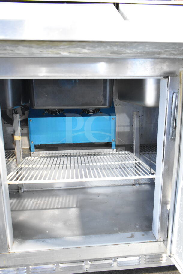Beverage Air SP72-30M commercial sandwich salad prep table, mega top, 115 volts, 1 phase, interior view, clean condition.
