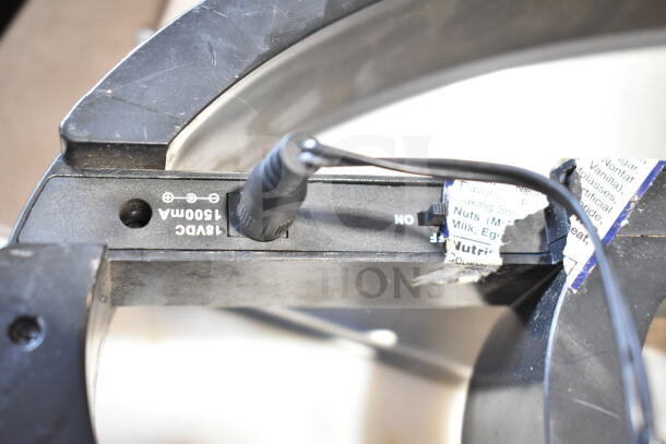"Open" light-up sign, rectangular, black frame, visible power cord and switch, model details: 18VDC 1500mA.