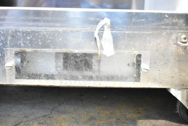 Entree S48-SI-HC prep table, visible wear, marks on metal surface; 115V, single phase. Suitable for sandwiches, salads.