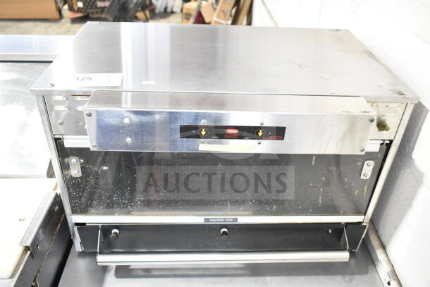 Hatco Commercial Countertop Heated Display Merchandiser, 120V, 1 Phase, stainless steel, visible wear, labeled "Caution: Hot."