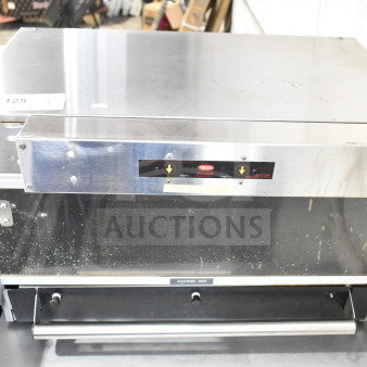Hatco Commercial Countertop Heated Display Merchandiser, 120V, 1 Phase, stainless steel, visible wear, labeled "Caution: Hot."