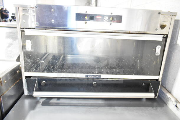 Hatco Commercial Countertop Heated Display Merchandiser, 120 Volts, used condition, "Caution - Hot" label visible.