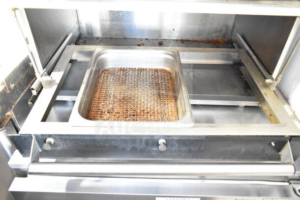 Hatco Commercial Heated Display Merchandiser, countertop model, 120 volts, 1 phase. Shows signs of use, stainless steel interior.