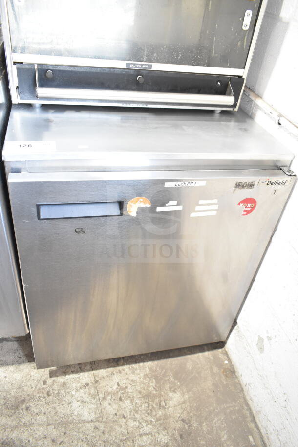 Delfield Commercial Single Door Undercounter Cooler, 115V, 1 Phase, with visible labels and slight wear marks.
