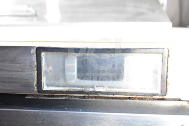 Atosa MSF8304GR sandwich salad prep table display panel showing temperature, slight wear visible around edges.