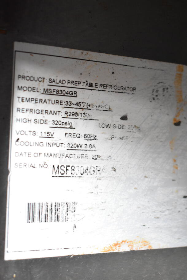 Label on Atosa MSF8304GR commercial prep table. Indicates model, temperature range, refrigerant type, and voltage.