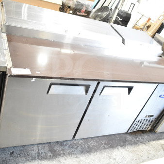 2018 Atosa MPF8202GR pizza prep table, stainless steel, on commercial casters, 115V, 1 phase. Signs of use visible.