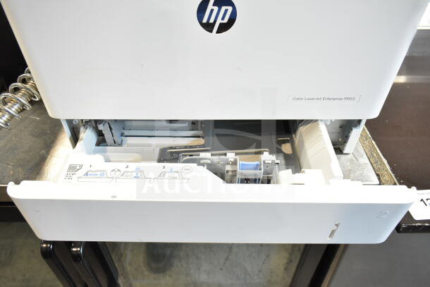 HP BOISB-1406-02 countertop printer, 100-127 volts, 1 phase, paper tray open, with HP logo and instructions visible.